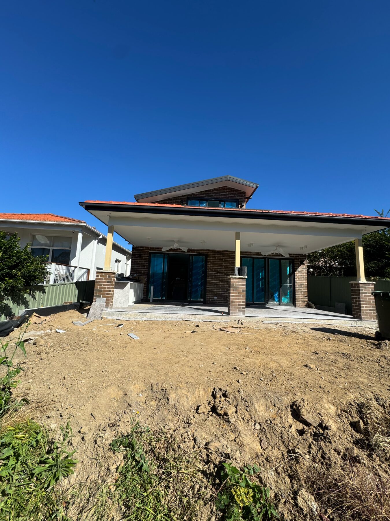 Completed large brick extension with covered rear patio