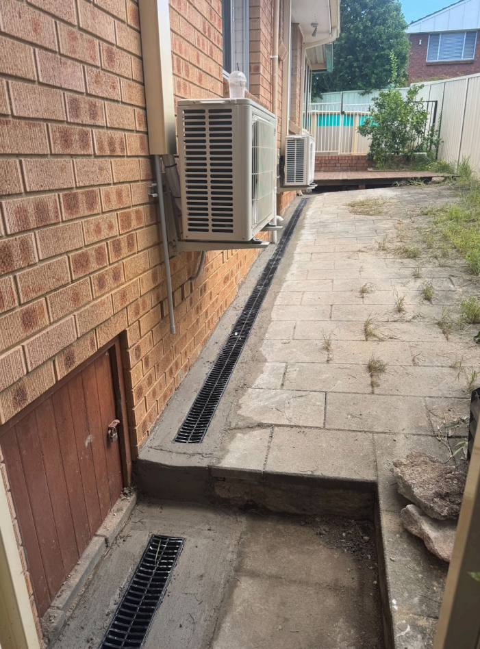 Strip drain installation down side of house in Arncliffe to stop water entering under the house